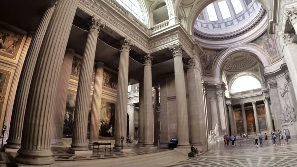 Grand interior of the Pantheon with towering columns and high arches