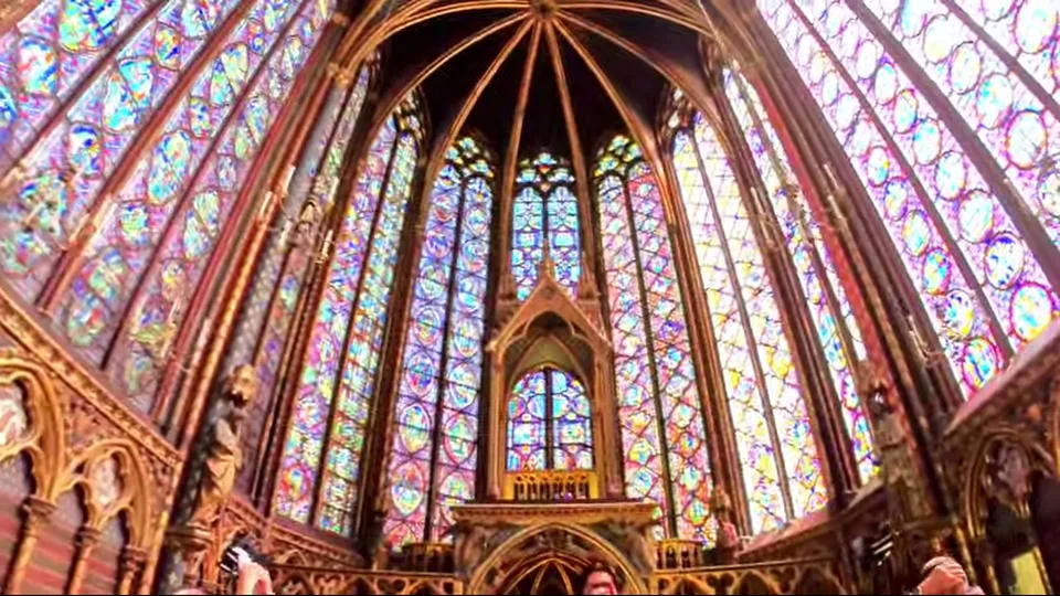 Symmetrical upper chapel apse and stained glass at Sainte-Chapelle
